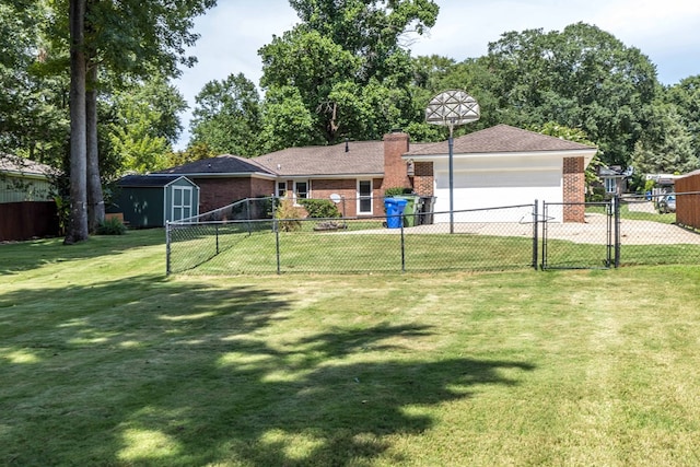 6215 Seaton Dr, Columbus, GA 31909 - view of yard featuring a storage unit, a garage, concrete driveway, and a gate