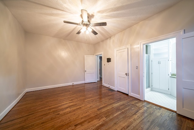 2010 Cherokee Dr, Columbus, GA 31906 - spare room featuring dark wood-type flooring, a ceiling fan, and a textured ceiling