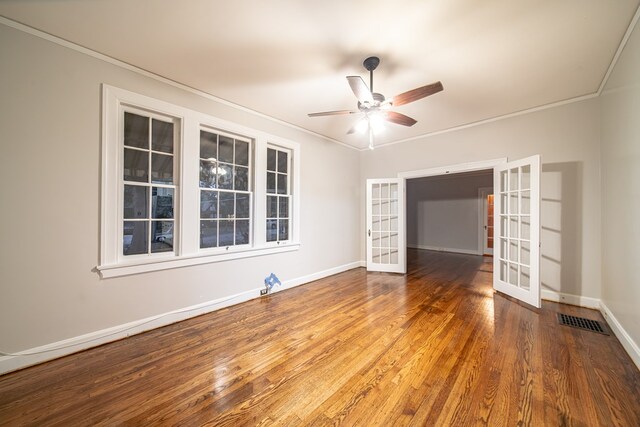2010 Cherokee Dr, Columbus, GA 31906 - empty room with french doors, crown molding, a ceiling fan, and wood finished floors