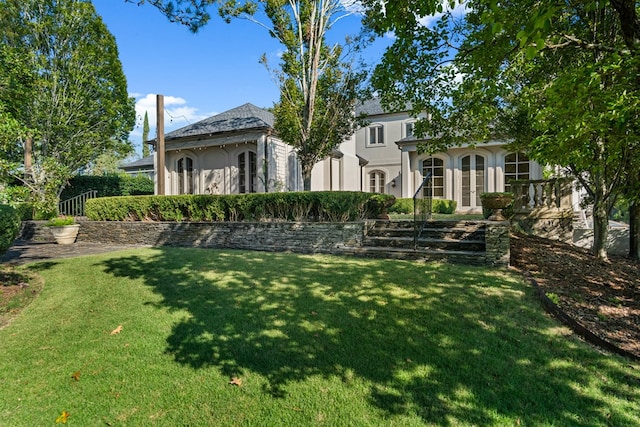 view of yard featuring french doors