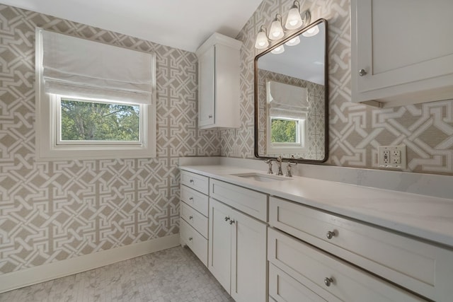 bathroom with vanity and a healthy amount of sunlight