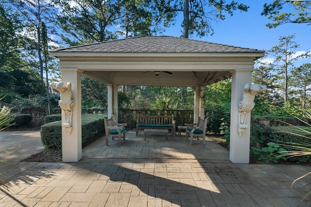 view of patio / terrace featuring a gazebo and ceiling fan