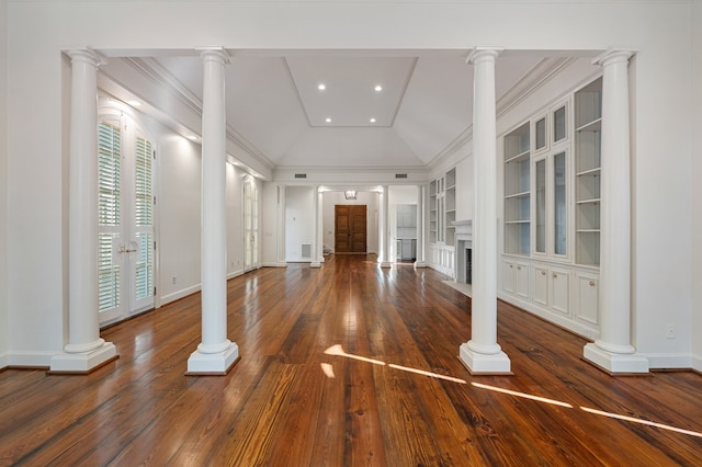 unfurnished living room featuring french doors, vaulted ceiling, dark hardwood / wood-style floors, built in shelves, and ornamental molding