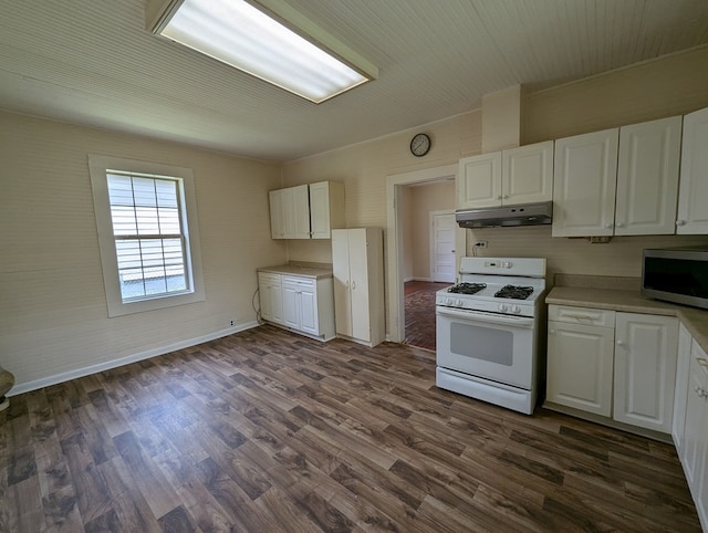 kitchen with white cabinets, white gas range, and dark wood-type flooring