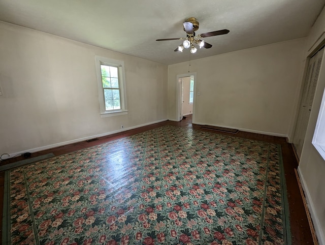 unfurnished room with ceiling fan