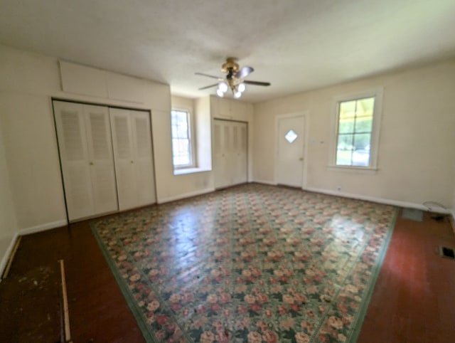 entryway featuring ceiling fan and a healthy amount of sunlight