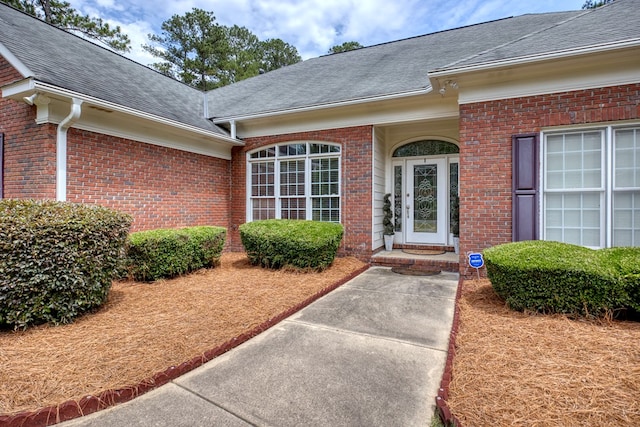 1000 Gramercy Dr, Midland, GA 31820 - entrance to property with a shingled roof and brick siding