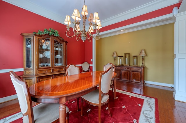 1000 Gramercy Dr, Midland, GA 31820 - dining area with a chandelier, crown molding, hardwood / wood-style floors, and baseboards