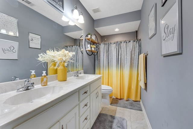 1000 Gramercy Dr, Midland, GA 31820 - bathroom with toilet, double vanity, tile patterned floors, baseboards, and curtained shower