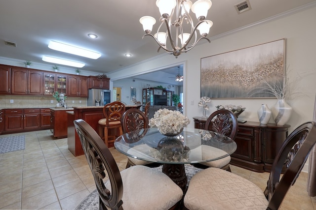 1000 Gramercy Dr, Midland, GA 31820 - dining room with ornamental molding, a chandelier, light tile patterned flooring, recessed lighting, and a ceiling fan