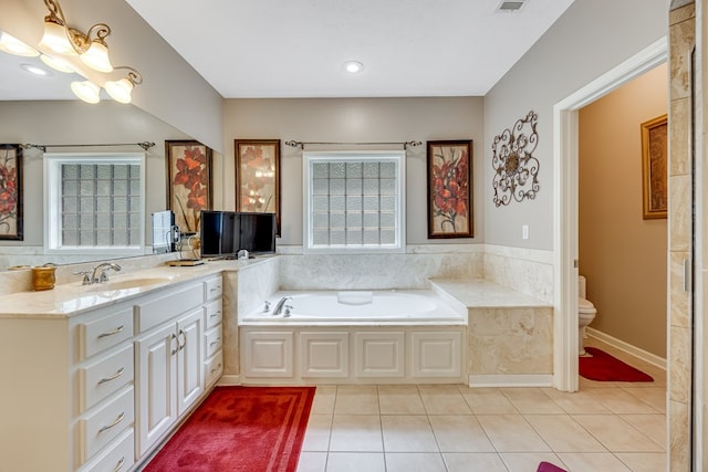 1000 Gramercy Dr, Midland, GA 31820 - bathroom featuring a bath, vanity, tile patterned flooring, toilet, and recessed lighting