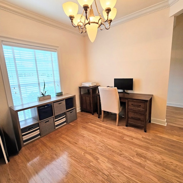 office space featuring light wood finished floors, baseboards, a chandelier, and crown molding