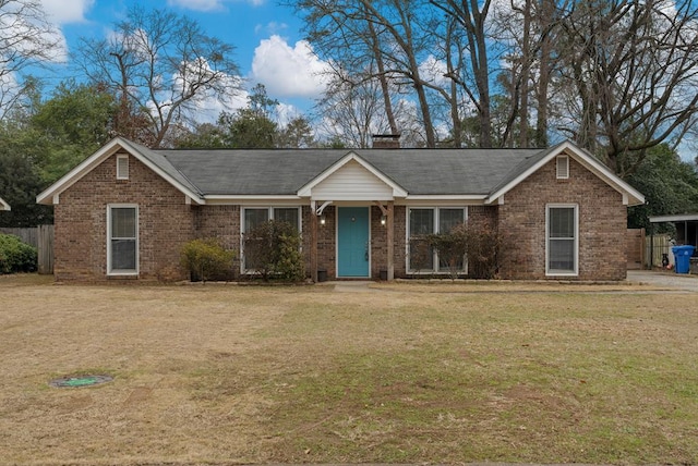 ranch-style home with a front yard