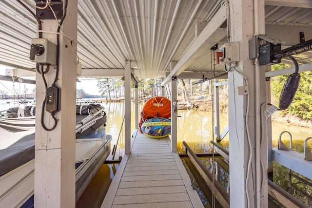566 Longview Dr, Hamilton, GA 31811 - dock area featuring boat lift and a water view