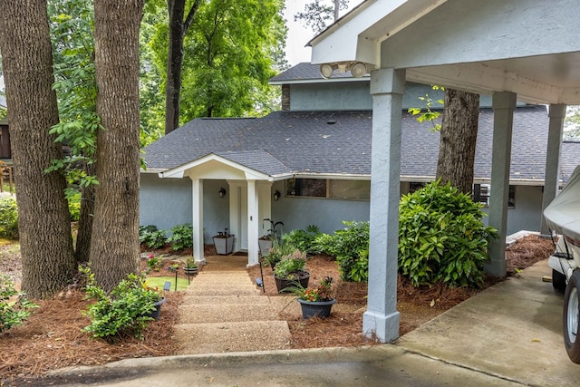 566 Longview Dr, Hamilton, GA 31811 - view of front facade featuring roof with shingles and stucco siding