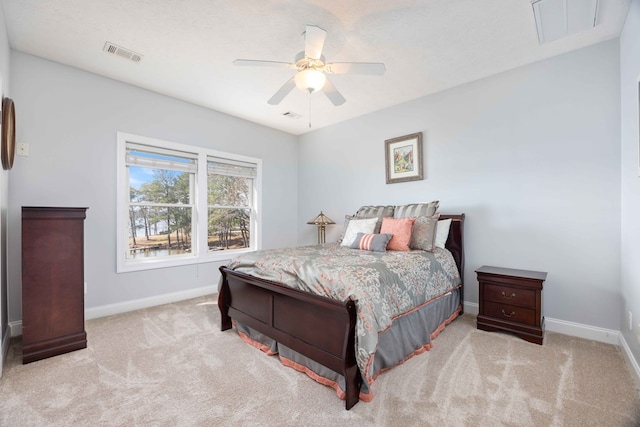 566 Longview Dr, Hamilton, GA 31811 - bedroom with baseboards, carpet floors, and ceiling fan