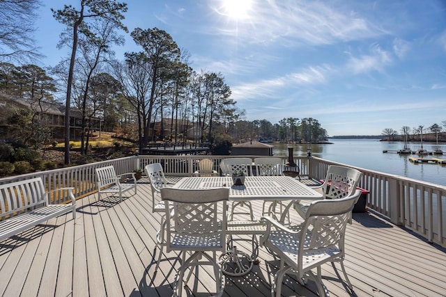 566 Longview Dr, Hamilton, GA 31811 - wooden deck with a water view and outdoor dining space