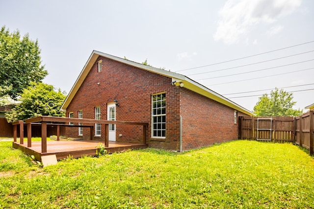 232 Mill Pond Dr, Phenix City, AL 36870 - back of property featuring brick siding and a wooden deck