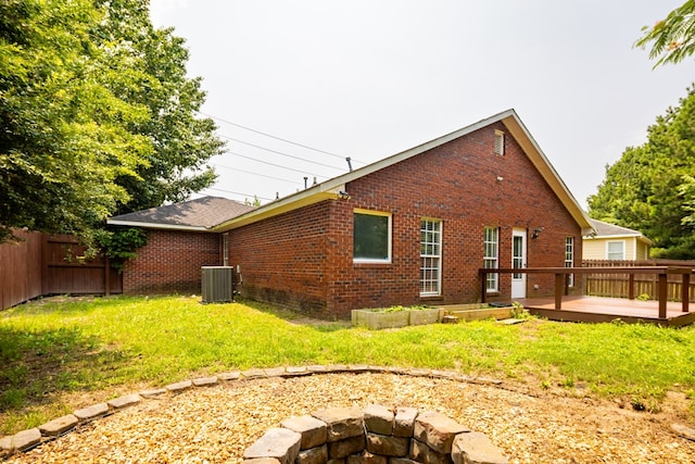 232 Mill Pond Dr, Phenix City, AL 36870 - rear view of property featuring brick siding, a wooden deck, and cooling unit