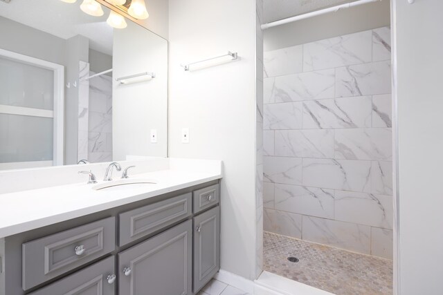 232 Mill Pond Dr, Phenix City, AL 36870 - bathroom with vanity and tiled shower