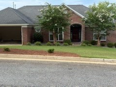 986 Timber Creek Way, Columbus, GA 31904 - view of front facade featuring a front lawn and a garage