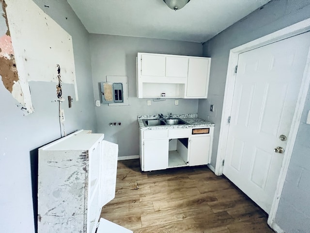 3413 Terminal Ct, Columbus, GA 31906 - kitchen featuring dark wood-type flooring, white cabinetry, and light countertops