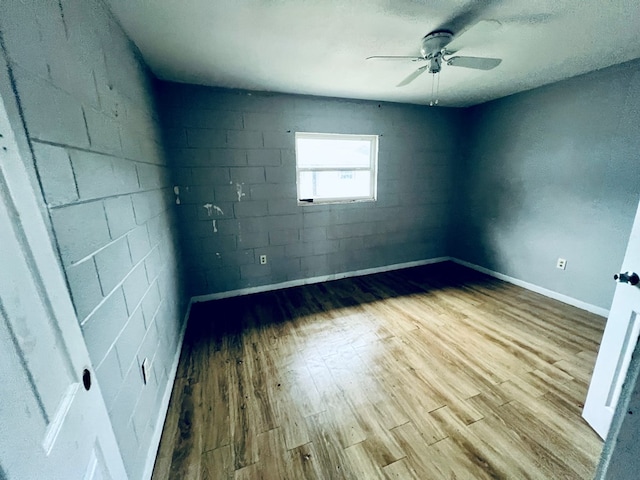 3413 Terminal Ct, Columbus, GA 31906 - empty room featuring a ceiling fan, wood finished floors, and concrete block wall