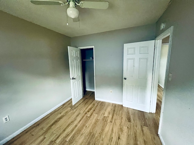 3413 Terminal Ct, Columbus, GA 31906 - unfurnished bedroom featuring wood finished floors, a closet, and a ceiling fan