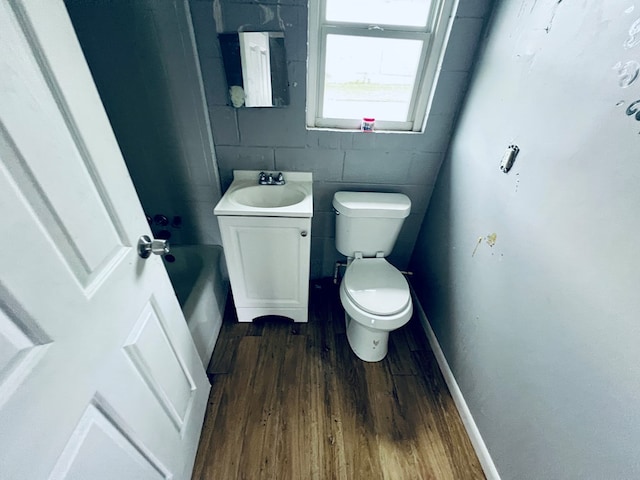 3413 Terminal Ct, Columbus, GA 31906 - bathroom with wood finished floors, a tub to relax in, and vanity