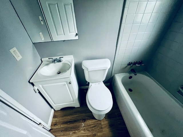 3413 Terminal Ct, Columbus, GA 31906 - full bathroom featuring wood finished floors, vanity, and washtub / shower combination
