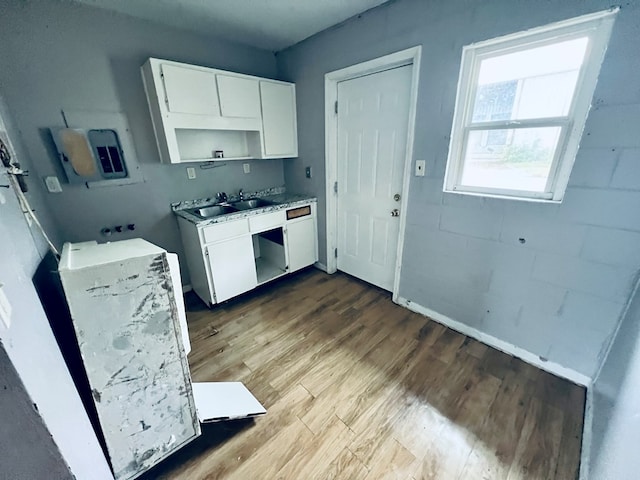 3413 Terminal Ct, Columbus, GA 31906 - kitchen featuring white cabinets, wood finished floors, and light countertops