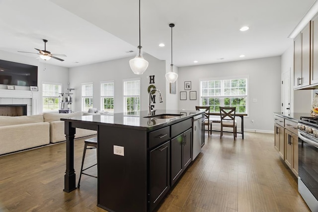 492 Mulberry Crossing Dr, Cataula, GA 31804 - kitchen featuring a sink, appliances with stainless steel finishes, a breakfast bar area, recessed lighting, and ceiling fan