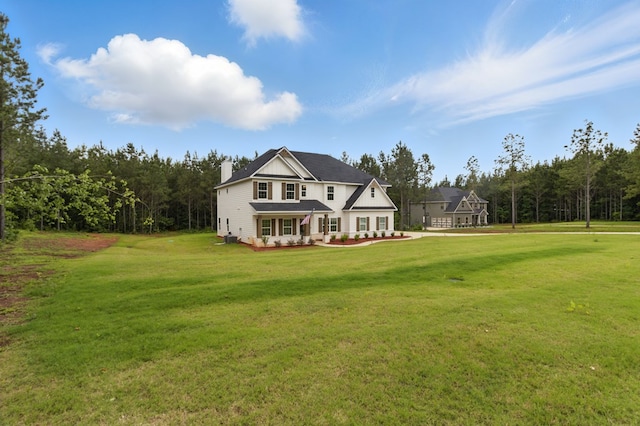 492 Mulberry Crossing Dr, Cataula, GA 31804 - rear view of house with a chimney and a lawn