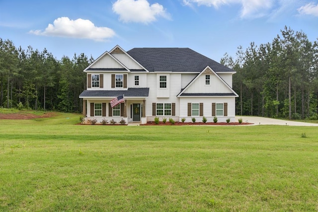492 Mulberry Crossing Dr, Cataula, GA 31804 - view of front facade featuring a front yard and roof with shingles