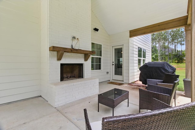 492 Mulberry Crossing Dr, Cataula, GA 31804 - view of patio / terrace featuring grilling area and an outdoor living space with a fireplace