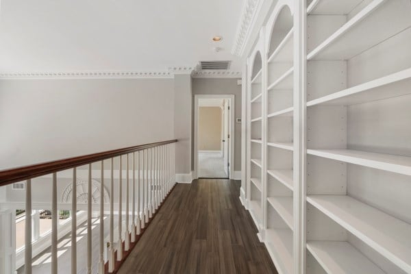 hallway featuring dark hardwood / wood-style floors