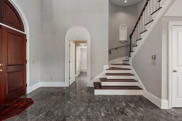 entrance foyer with a towering ceiling