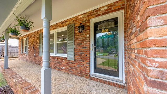 4001 Savannah Dr, Columbus, GA 31907 - doorway to property with brick siding and a porch