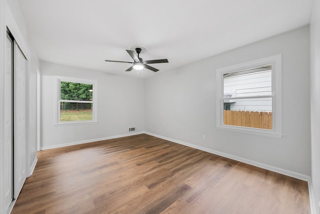 4001 Savannah Dr, Columbus, GA 31907 - unfurnished bedroom with wood finished floors, a closet, and ceiling fan