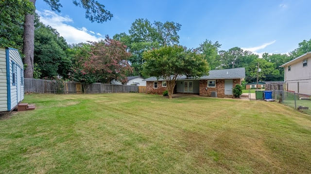 4001 Savannah Dr, Columbus, GA 31907 - fenced backyard featuring french doors