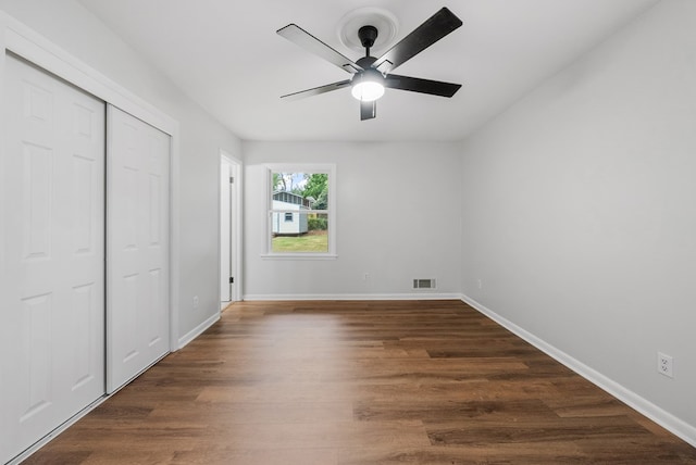 4001 Savannah Dr, Columbus, GA 31907 - unfurnished bedroom featuring dark wood-type flooring, a closet, and ceiling fan