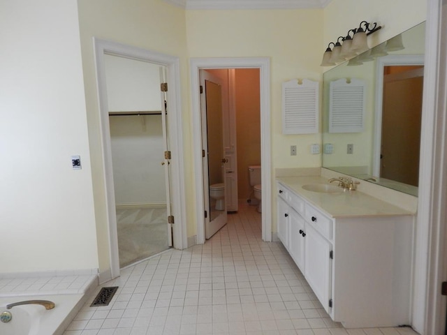 5110 Midland Trce, Columbus, GA 31820 - full bath featuring toilet, vanity, tile patterned floors, and a spacious closet