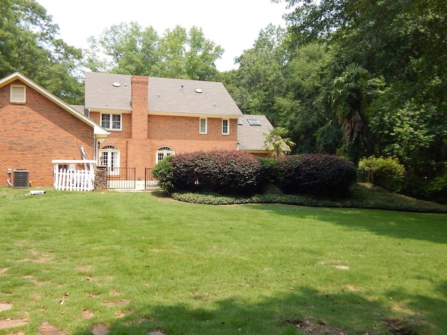 5110 Midland Trce, Columbus, GA 31820 - view of grassy yard with central AC