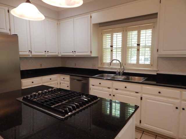 5110 Midland Trce, Columbus, GA 31820 - kitchen with stainless steel appliances, a sink, and white cabinetry