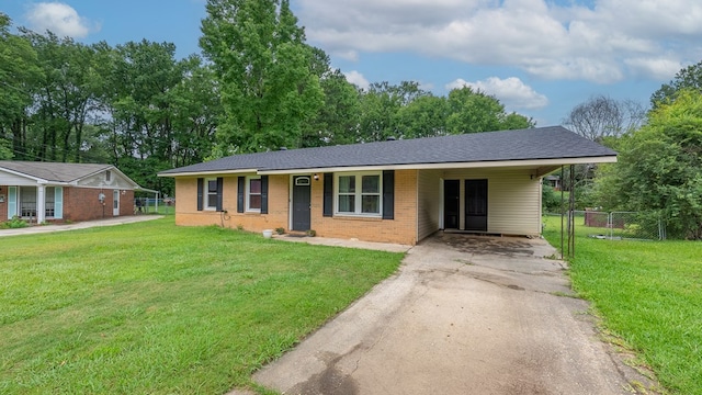 5407 Maltese Dr, Columbus, GA 31904 - single story home featuring concrete driveway, brick siding, and a carport