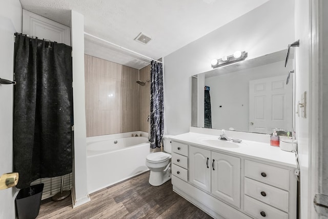 5407 Maltese Dr, Columbus, GA 31904 - bathroom featuring wood finished floors, vanity, and shower / tub combo with curtain
