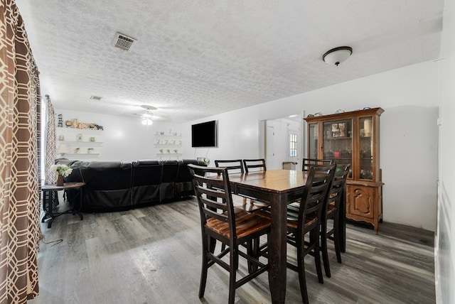 5407 Maltese Dr, Columbus, GA 31904 - dining space with wood finished floors, a textured ceiling, and ceiling fan