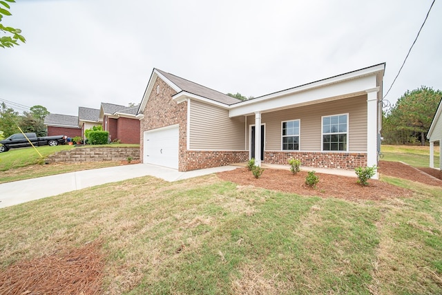 view of front of property featuring covered porch, a garage, and a front lawn