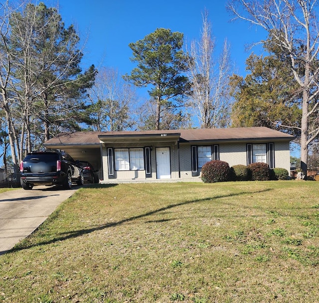 ranch-style home featuring driveway, a front lawn, a carport, and brick siding