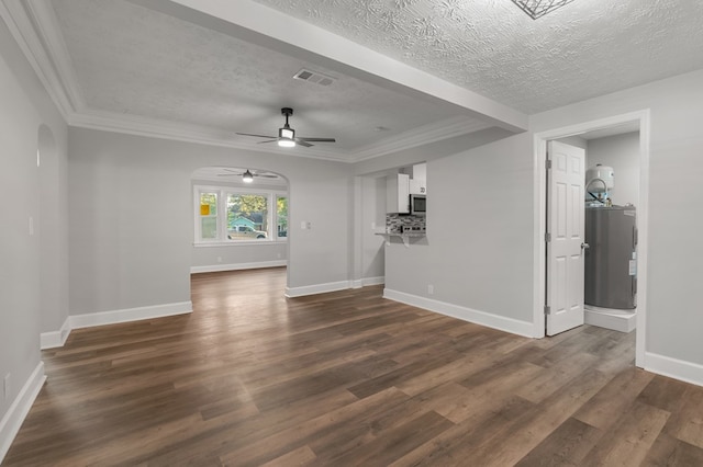 unfurnished living room with a textured ceiling, electric water heater, dark wood-type flooring, and ornamental molding